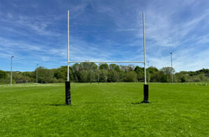 rugby goal posts photo on field representing common club pain points