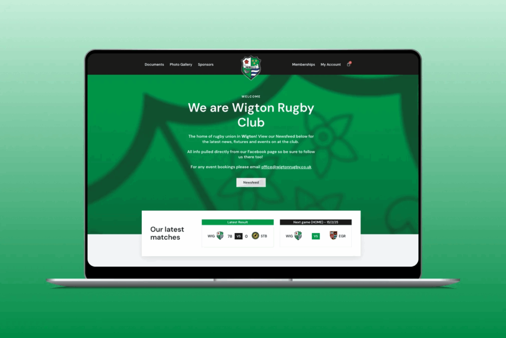 wigton rugby club website home screen on laptop with green background